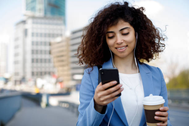 istock Young happy businesswoman communting to work 1174240728