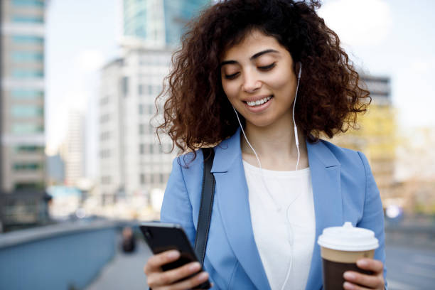 istock Young happy businesswoman communting to work 1174240873