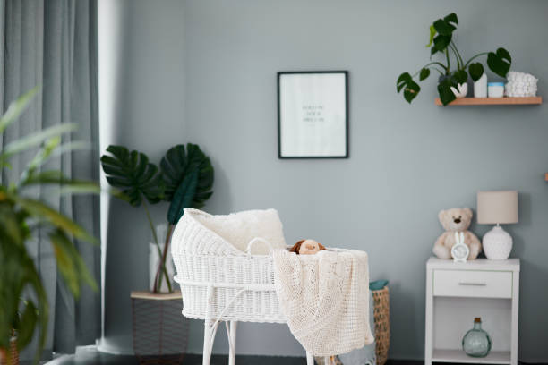 Still life shot of an empty crib in a nursery at home