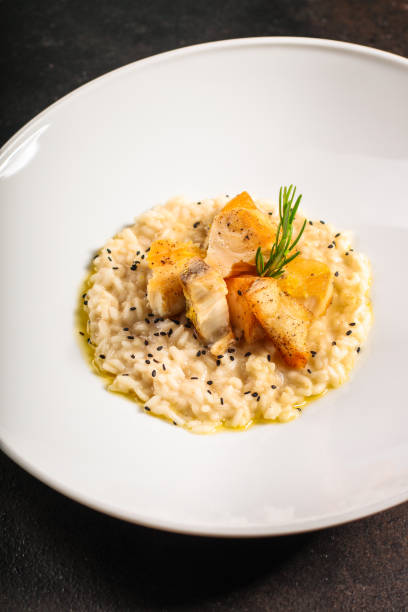 istock risotto fish (main course rice with seafood) menu concept. food background. copy space. Top view 1174253650
