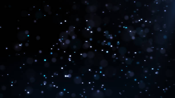 Silver Winter Floating Dust Particles with Flare on Black Background With Bokeh stock photo