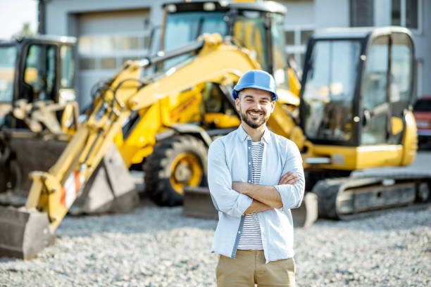 istock Builder at the shop with heavy machinery 1174262107