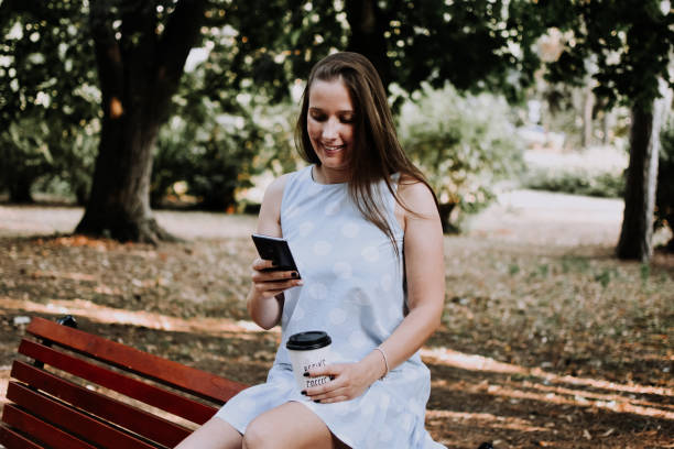 istock Attractive woman taking a coffee break 1174262468