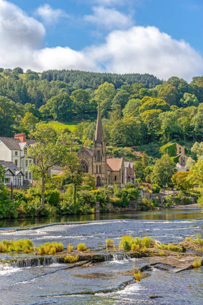 istock Church from across a river. 1174266115