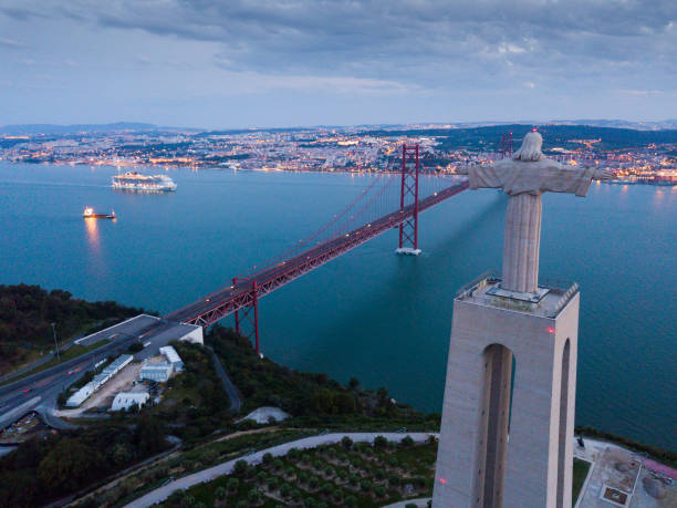 istock Illuminated Lisbon and 25th April Bridge 1174266931