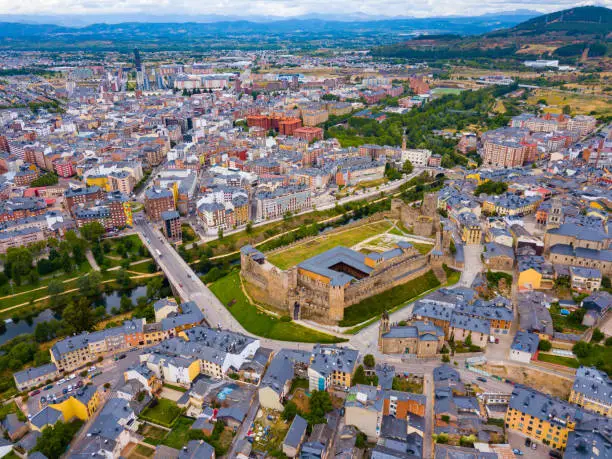 Scenic view from drone of Ponferrada cityscape with medieval Templar fortress, Spain