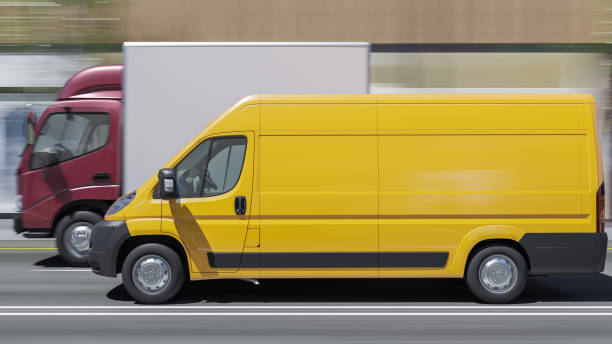istock Yellow Delivery Van Alongside a Cargo Truck with a Maroon Cab 1174269933