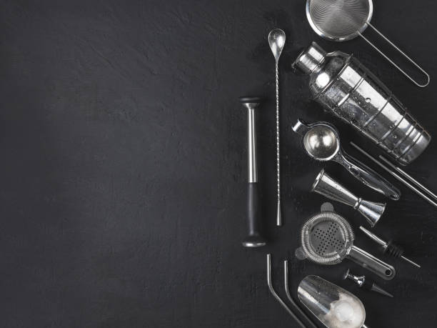 istock Accessories for making cocktails ,shaker, glass, jigger, filter, scoop, straws, spoon bar , mudler, geyser, strainer, ice cubes , mint leaves 1174270148