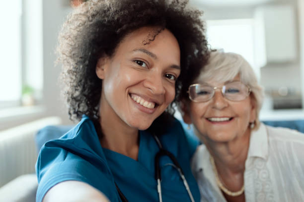 istock Female Mixed Race Nurse and Elderly Patient Taking a Selfie 1174270214