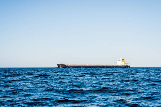 istock Large cargo ship in the North sea on a clear sunny day. Norway 1174272377