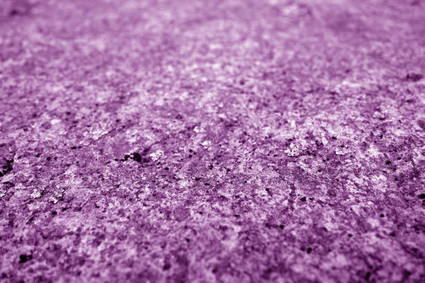 Marble stone background with blur effect in purple tone. Abstract architectural background and texture for design.