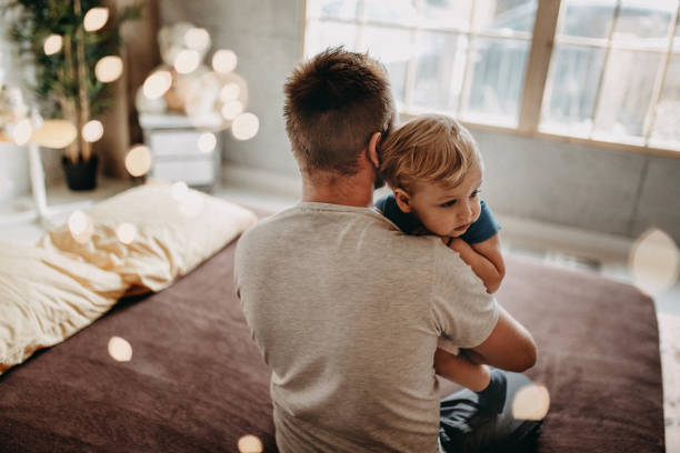 istock Father and son playing in the bedroom 1174276773