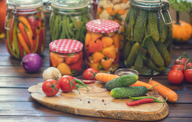 istock Preserving Fresh Organic Vegetables in Jars 1174280543