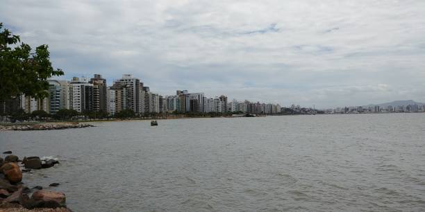 istock A nice stroll through the downtown Florianopolis boardwalk on a cloudy summer day. 1174281907