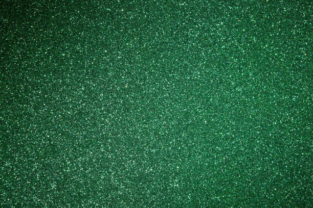 istock Glittering green texture. New year background. 1174282737