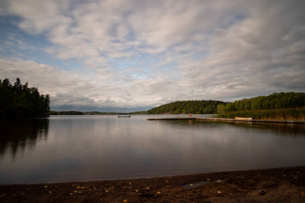 istock lake in Sweden with cloudy sky 1174284289