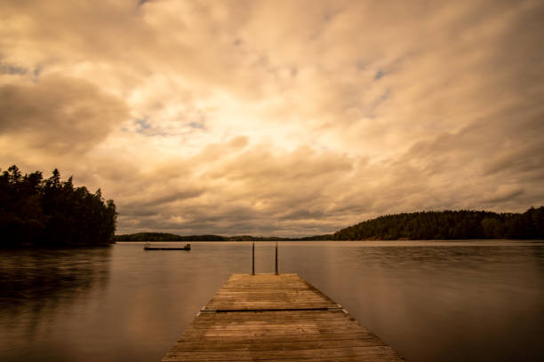 istock lake in Sweden with cloudy sky 1174284311