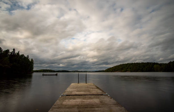 istock lake in Sweden with cloudy sky 1174284319
