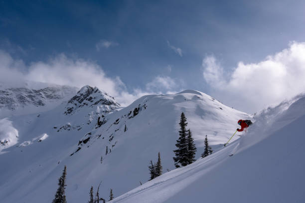 istock Skiing fresh powder on a ski vacation 1174289772