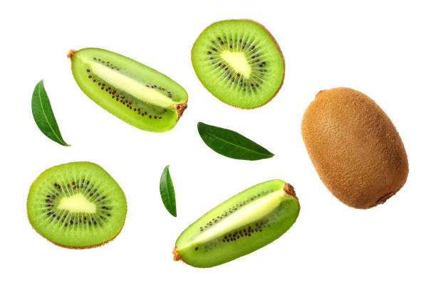 istock kiwi fruit with slices and green leaves isolated on a white background. top view 1174291596