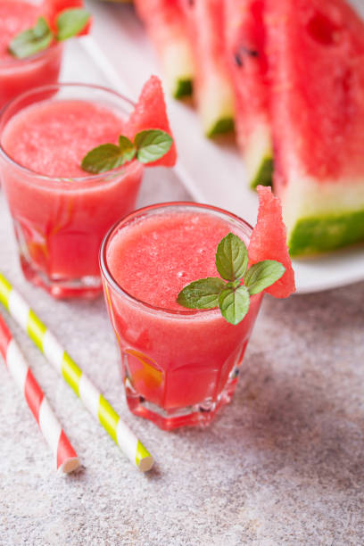 istock Glasses of watermelon smoothie with mint 1174292638