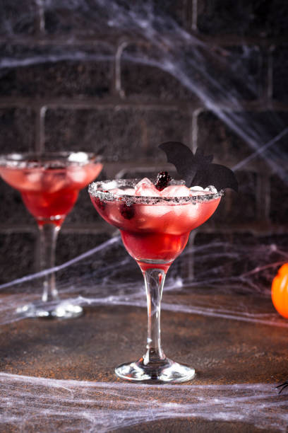 istock Halloweens spooky drink with blackberry 1174293200
