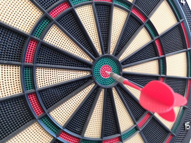 istock game of darts hanging on the wall 1174293565