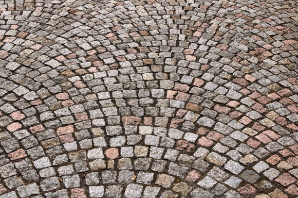 istock Texture of cobblestone in old town 1174293968