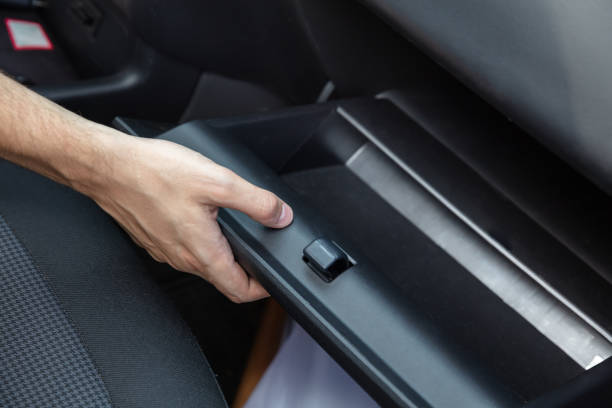 Driver Opening Empty Glovebox Compartment Driver Opening Empty Glovebox Compartment Inside Car glove box stock pictures, royalty-free photos & images