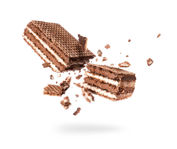 istock Chocolate waffles broken into two halves isolated on a white background 1174297452