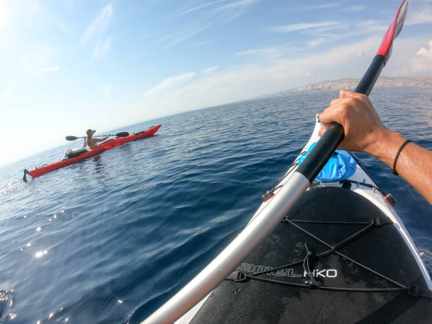 istock Couple kayaking point of view 1174301559