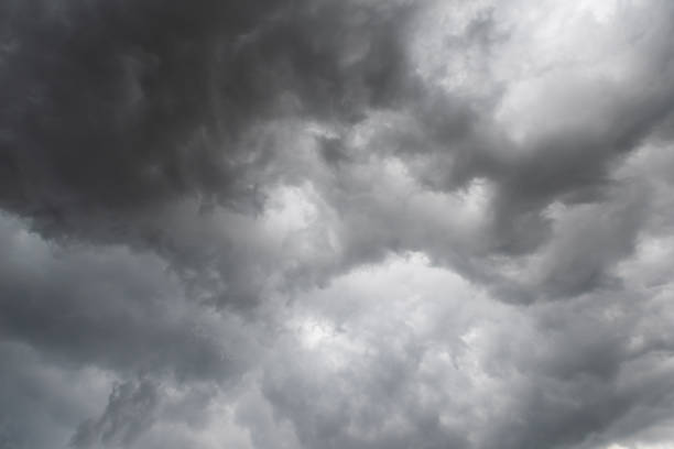 istock Weather in summer with black cloud and storm, Dark sky and dramatic storm clouds 1174317735