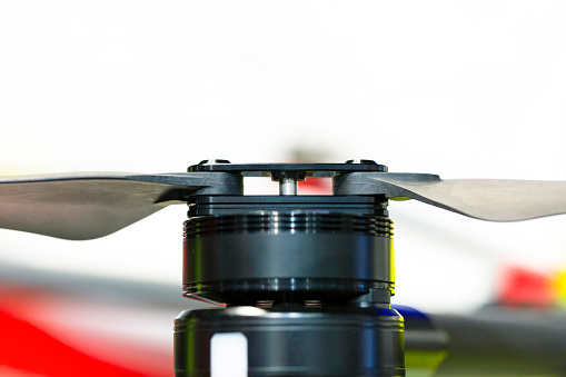 Drone motor with propellers, background with copy space, horizontal composition