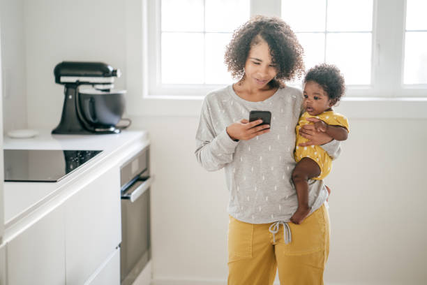 istock Baby and mother at home 1174318685