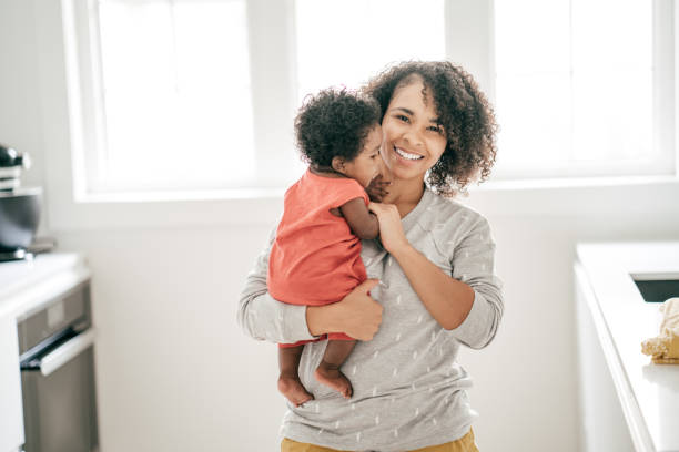 istock Baby and mother at home 1174318726