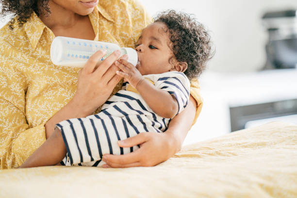 istock Baby and mother at home 1174318731