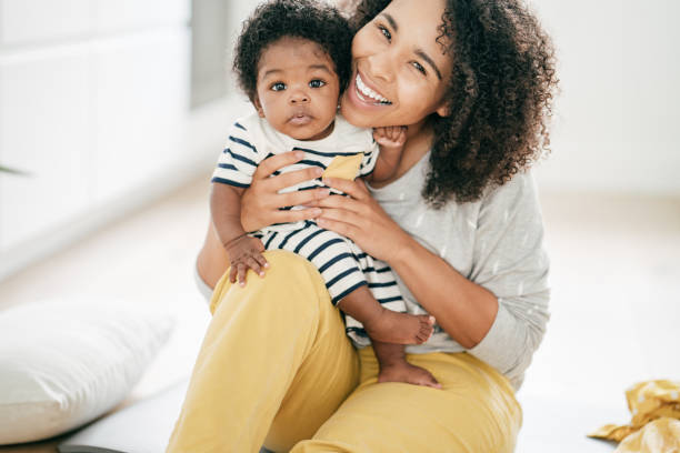 istock Baby and mother at home 1174318734