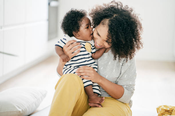 istock Baby and mother at home 1174318761