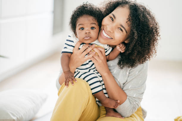 istock Baby and mother at home 1174318768
