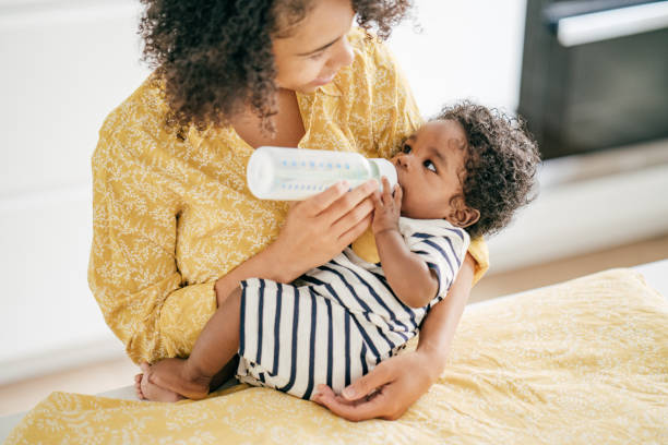 istock Baby and mother at home 1174318769