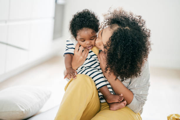 istock Baby and mother at home 1174318792