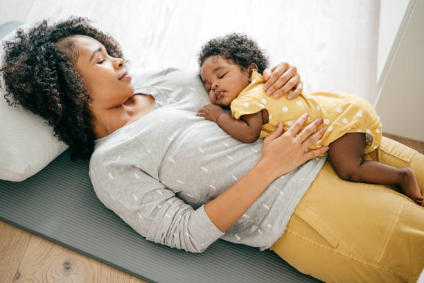 istock Baby and mother at home 1174318804