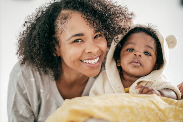 istock Baby and mother at home 1174318825