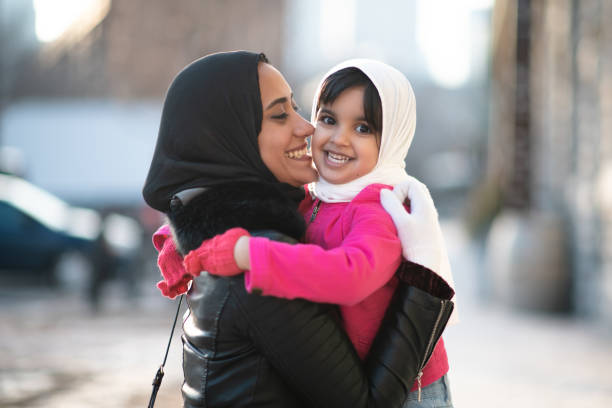 istock Smiling Muslim mother and child 1174321696