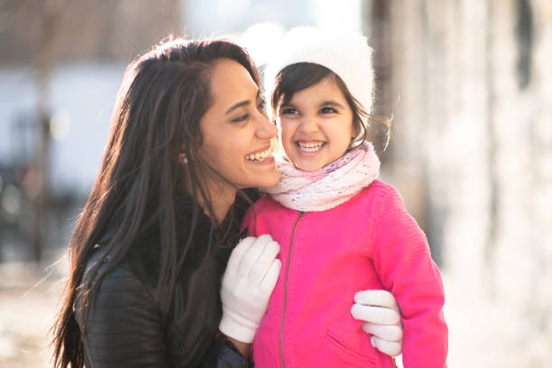 istock Smiling Muslim mother and child 1174321702