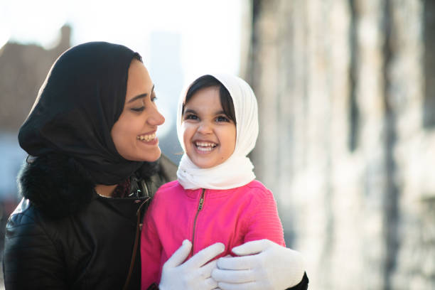 istock Smiling Muslim mother and child 1174321710