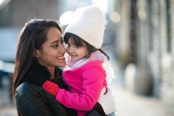 istock Smiling Muslim mother and child 1174321714