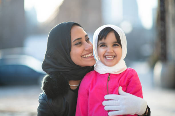 istock Smiling Muslim mother and child 1174321761