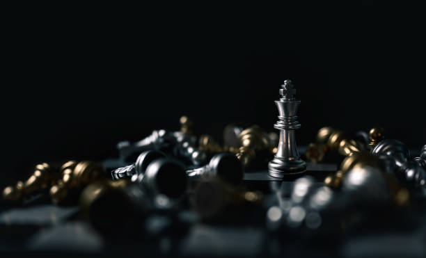 istock Chess board game.Leader and teamwork concept for success. Chess concept save the king and save the strategy. 1174333026