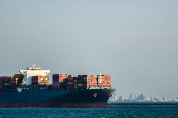 istock Logistics and transportation of international container cargo ship. 1174333028